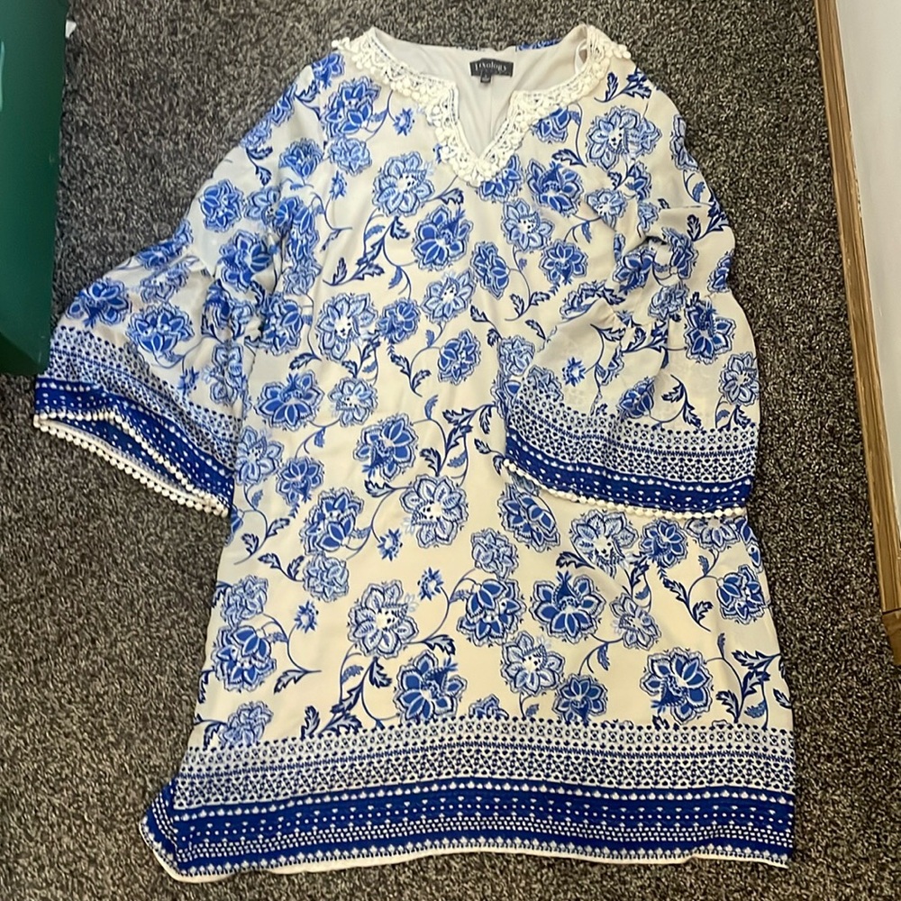 Fully lined blue and white patterned shift dress with bell sleeves